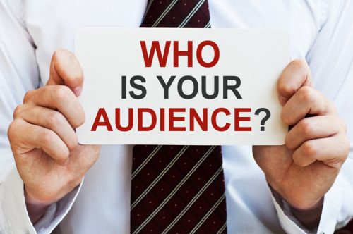 Who is your audience? Card in hands of businessman